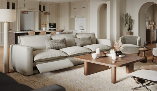 A sophisticated modern living room featuring a plush beige reclining sectional sofa as the centerpiece.